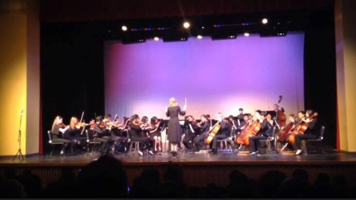 woman conducting concert